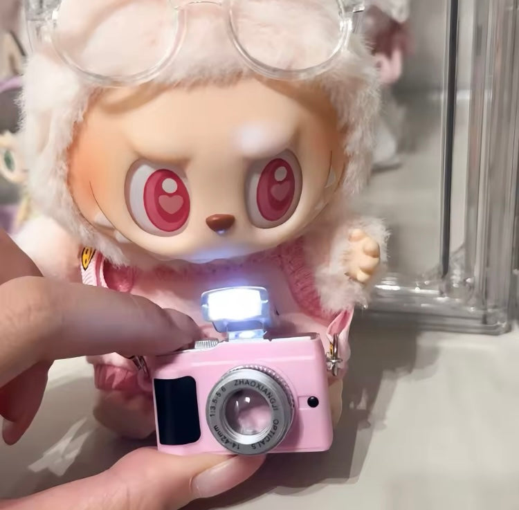 Cámara fotográfica para muñeco bubu con flash color negro COS0102